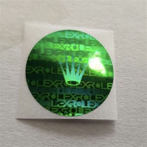 green hologram sticker on caseback.